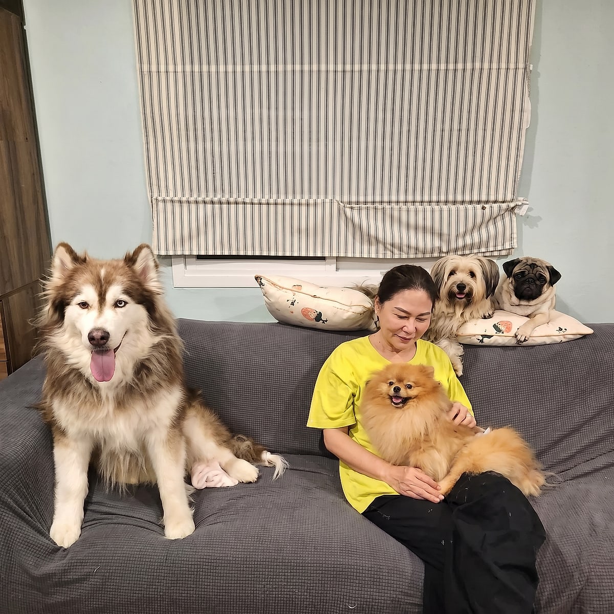Khun Mod with one of the dogs